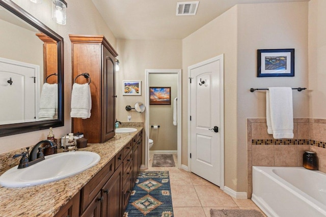 157 Old Firetower Rd, Bastrop, TX 78602 - full bathroom with tile patterned floors, a garden tub, and double vanity
