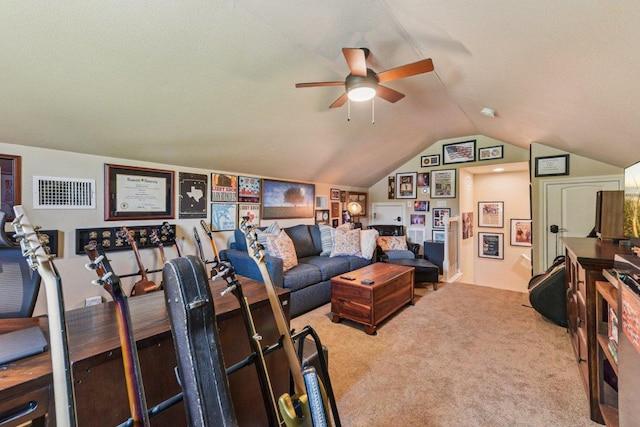 157 Old Firetower Rd, Bastrop, TX 78602 - living area featuring a ceiling fan, vaulted ceiling, and carpet flooring