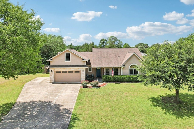 157 Old Firetower Rd, Bastrop, TX 78602 - view of front of house featuring driveway, a front yard, stone siding, and an attached garage