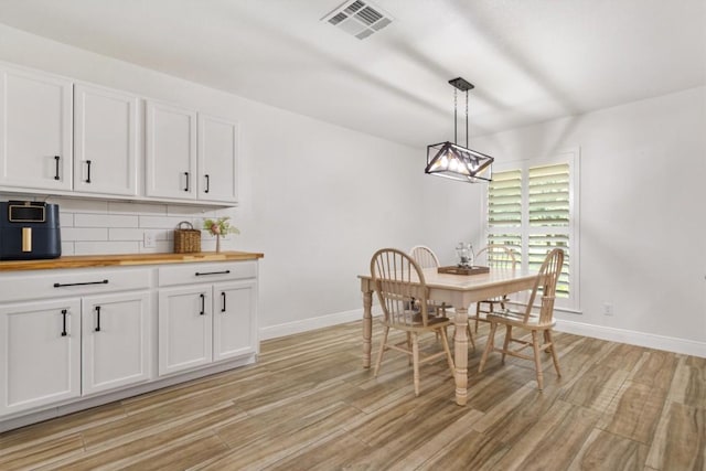 4001 Granada Dr, Georgetown, TX 78628 - dining area featuring light wood finished floors and baseboards