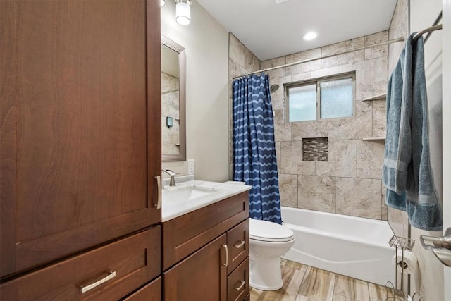 4001 Granada Dr, Georgetown, TX 78628 - bathroom with vanity, shower / bath combo with shower curtain, and wood finished floors