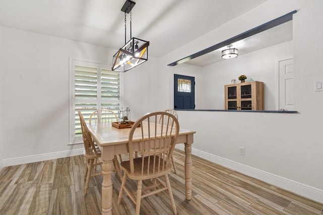 4001 Granada Dr, Georgetown, TX 78628 - dining room with wood finished floors and healthy amount of natural light