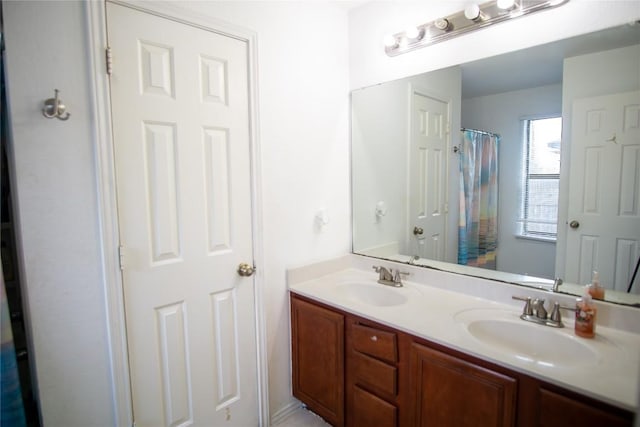 13604 Gilwell Dr, Del Valle, TX 78617 - bathroom featuring double vanity