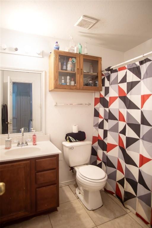 13604 Gilwell Dr, Del Valle, TX 78617 - bathroom featuring vanity, tile patterned floors, and curtained shower