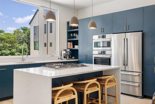 3100 Menchaca Rd Unit 24, Austin, TX 78704 - kitchen with stainless steel appliances, blue cabinets, open shelves, and a kitchen bar