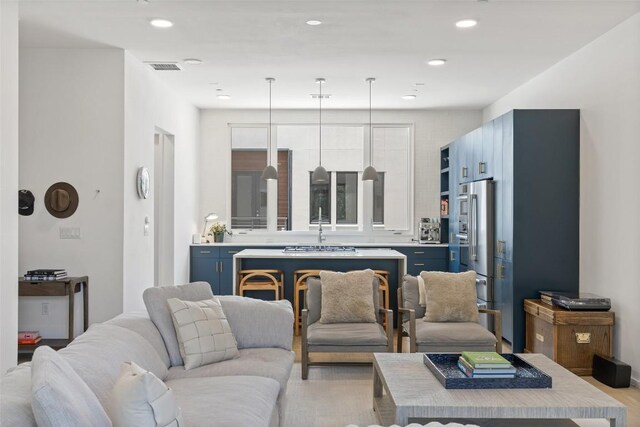 3100 Menchaca Rd Unit 24, Austin, TX 78704 - living area with light wood finished floors and recessed lighting