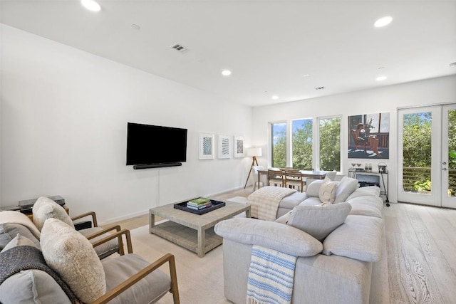 3100 Menchaca Rd Unit 24, Austin, TX 78704 - living area with recessed lighting, healthy amount of natural light, and light wood finished floors