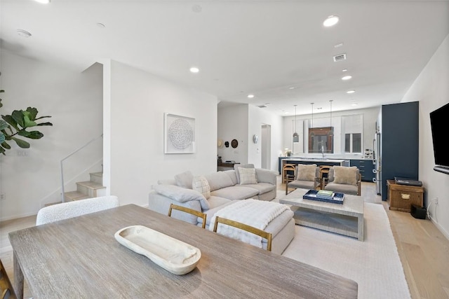 3100 Menchaca Rd Unit 24, Austin, TX 78704 - dining space with stairway, light wood finished floors, and recessed lighting