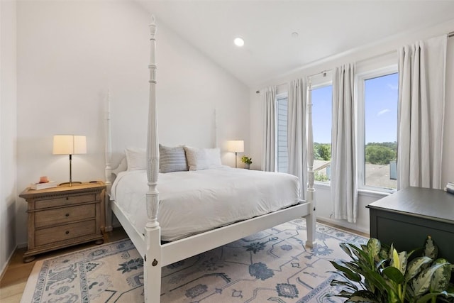 3100 Menchaca Rd Unit 24, Austin, TX 78704 - bedroom with recessed lighting, vaulted ceiling, and light wood-style floors
