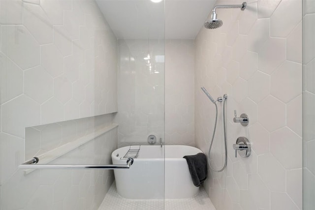3100 Menchaca Rd Unit 24, Austin, TX 78704 - bathroom with tiled shower, a soaking tub, and tile patterned floors