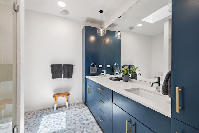 3100 Menchaca Rd Unit 24, Austin, TX 78704 - full bathroom with double vanity, a skylight, and recessed lighting