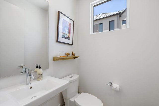 3100 Menchaca Rd Unit 24, Austin, TX 78704 - half bath with a sink and toilet