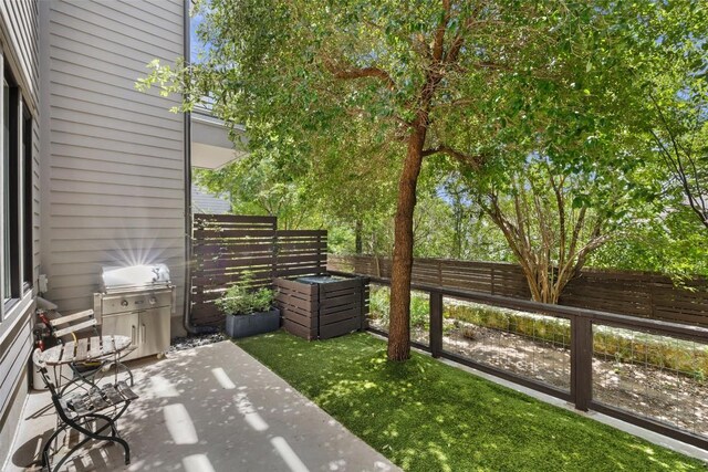 3100 Menchaca Rd Unit 24, Austin, TX 78704 - fenced backyard with a patio