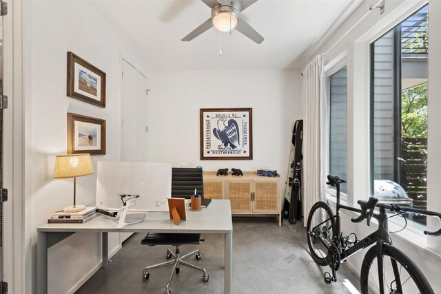 3100 Menchaca Rd Unit 24, Austin, TX 78704 - office area with finished concrete flooring and ceiling fan