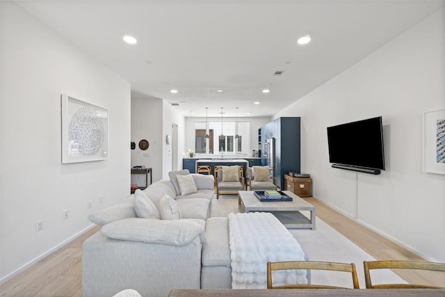 3100 Menchaca Rd Unit 24, Austin, TX 78704 - living area featuring light wood-type flooring and recessed lighting