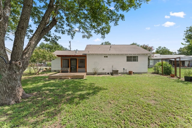 1215 Bois Darc St, Lockhart, TX 78644 - back of house with a wooden deck and crawl space