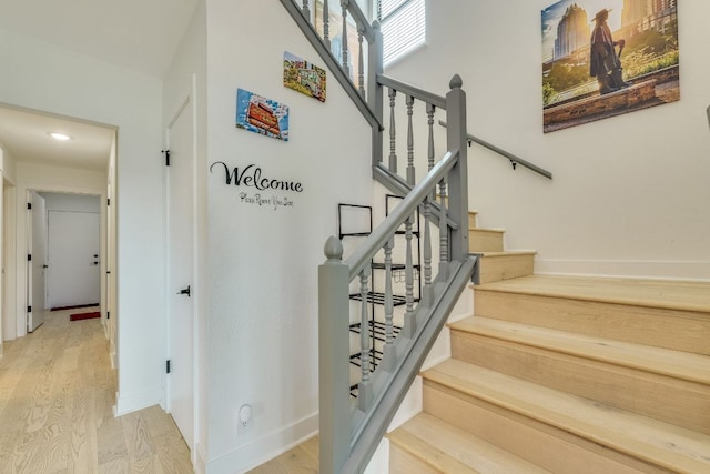 6904 Rusty Fig Dr, Austin, TX 78750 - stairway featuring wood finished floors and recessed lighting