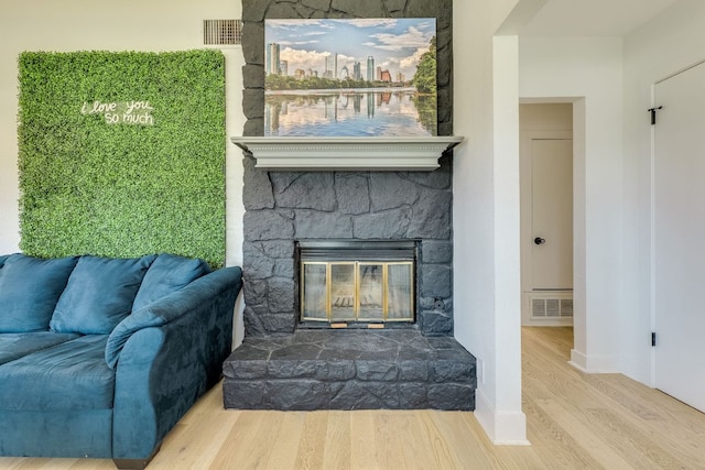 6904 Rusty Fig Dr, Austin, TX 78750 - living room with wood finished floors and a fireplace