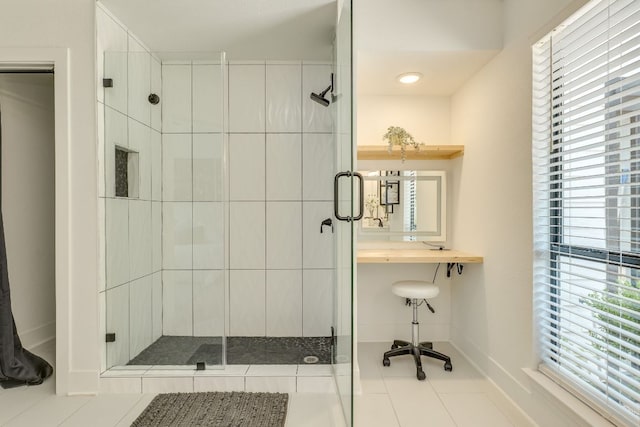 6904 Rusty Fig Dr, Austin, TX 78750 - bathroom featuring a stall shower, plenty of natural light, and tile patterned floors