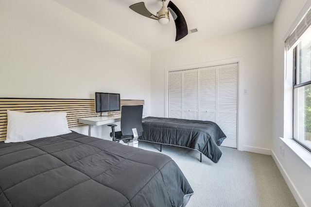 6904 Rusty Fig Dr, Austin, TX 78750 - bedroom featuring carpet floors, a closet, and ceiling fan