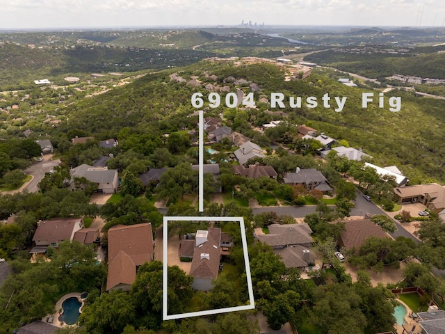 6904 Rusty Fig Dr, Austin, TX 78750 - aerial perspective of suburban area featuring property parcel outlined