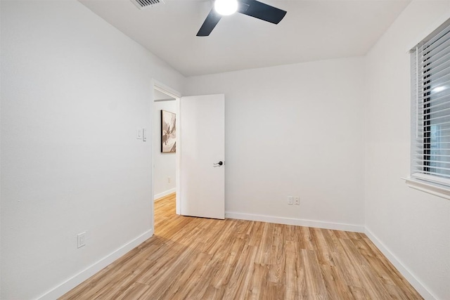 12307 Marogot Run, Austin, TX 78758 - empty room with ceiling fan and light wood-style floors