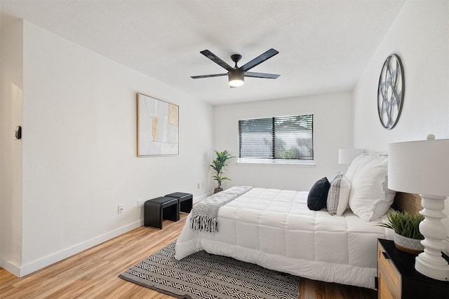 12307 Marogot Run, Austin, TX 78758 - bedroom with wood finished floors and a ceiling fan