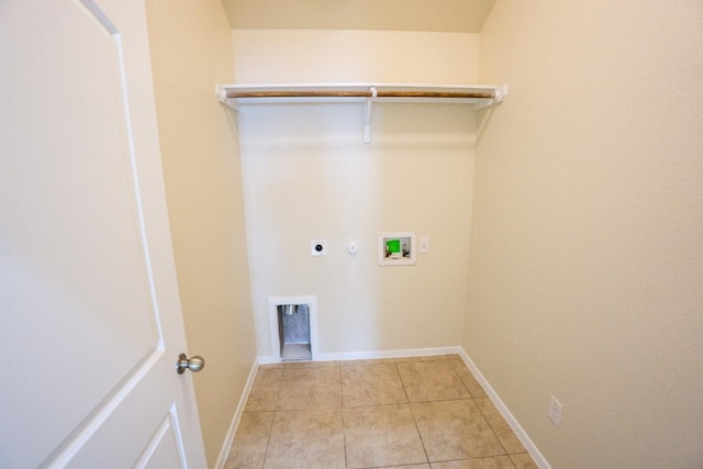 5865 Urbano Bnd, Round Rock, TX 78665 - laundry room with hookup for an electric dryer, washer hookup, light tile patterned flooring, and hookup for a gas dryer