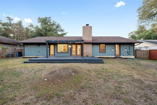 5809 Cherry Creek Dr, Austin, TX 78745 - rear view of house with a chimney, french doors, a fenced backyard, and a deck