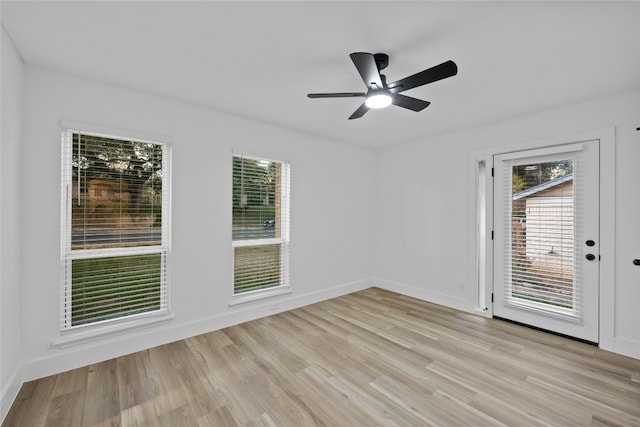 5809 Cherry Creek Dr, Austin, TX 78745 - empty room with light wood-style flooring and a ceiling fan