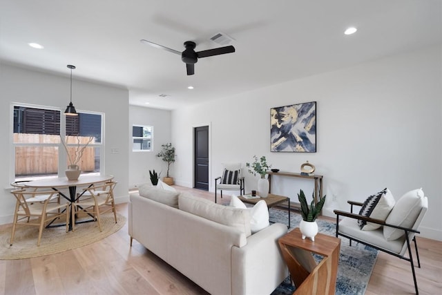 5304 Samuel Huston Ave Unit B, Austin, TX 78721 - living room featuring light wood-style flooring, ceiling fan, and recessed lighting