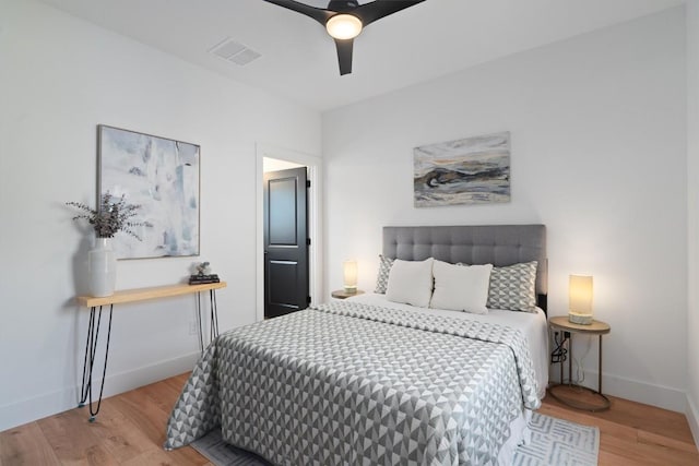 5304 Samuel Huston Ave Unit B, Austin, TX 78721 - bedroom with wood finished floors and a ceiling fan