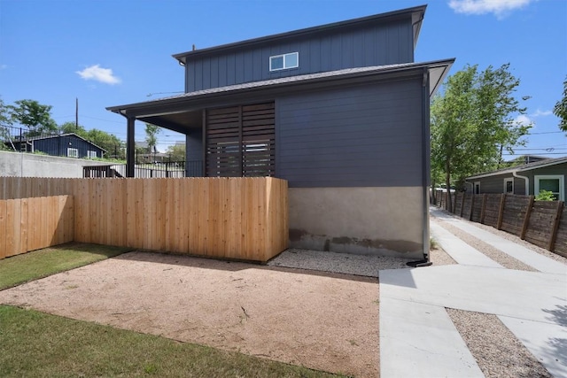 5304 Samuel Huston Ave Unit B, Austin, TX 78721 - view of side of property featuring board and batten siding