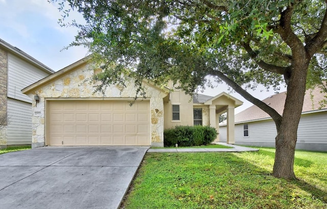 10423 Ancient Anchor, San Antonio, TX 78245 - single story home featuring concrete driveway, stone siding, a front yard, and a garage