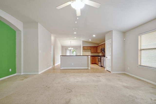 10423 Ancient Anchor, San Antonio, TX 78245 - unfurnished living room with vaulted ceiling, light colored carpet, ceiling fan, and recessed lighting