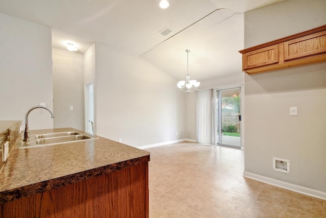 10423 Ancient Anchor, San Antonio, TX 78245 - kitchen with lofted ceiling, a chandelier, and pendant lighting
