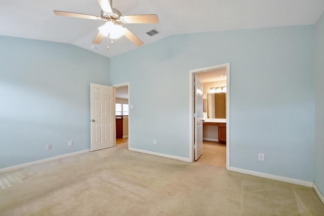 10423 Ancient Anchor, San Antonio, TX 78245 - unfurnished bedroom featuring vaulted ceiling, light carpet, ensuite bath, and a ceiling fan