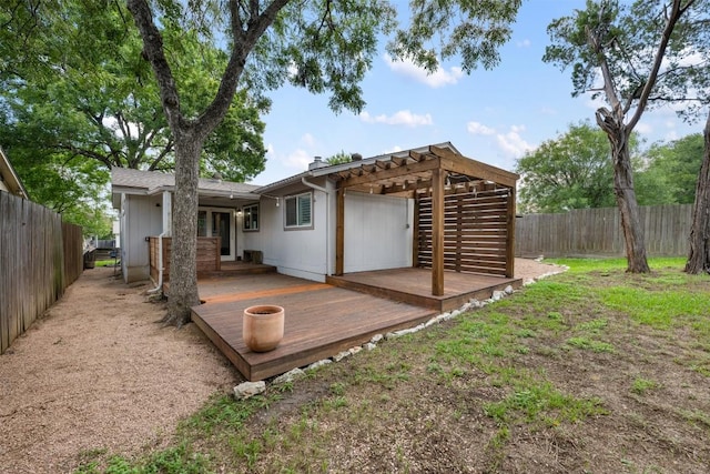 3207 Harpers Ferry Ln, Austin, TX 78745 - rear view of property featuring a wooden deck and a fenced backyard