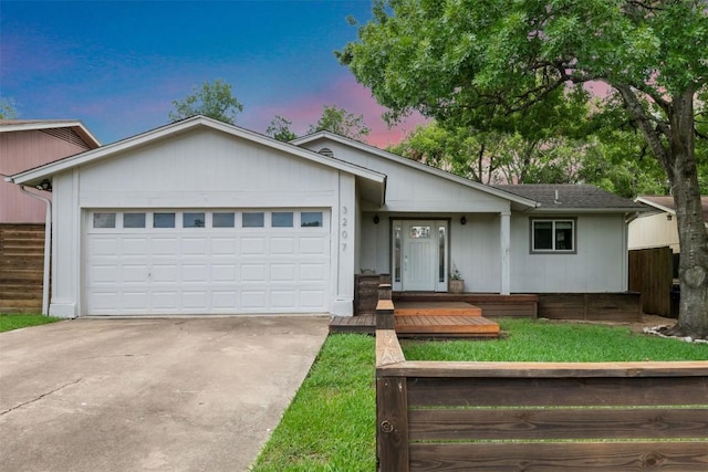 3207 Harpers Ferry Ln, Austin, TX 78745 - ranch-style home with concrete driveway and a garage