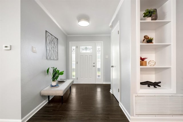 3207 Harpers Ferry Ln, Austin, TX 78745 - entryway with dark wood-type flooring and ornamental molding