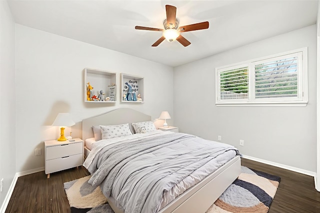 3207 Harpers Ferry Ln, Austin, TX 78745 - bedroom with dark wood-style floors and a ceiling fan