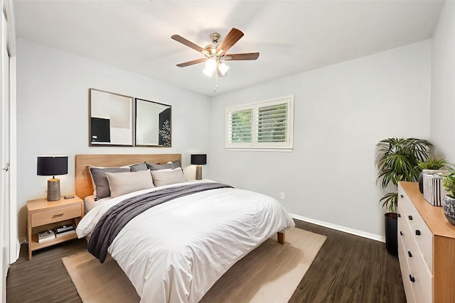 3207 Harpers Ferry Ln, Austin, TX 78745 - bedroom with dark wood finished floors and ceiling fan