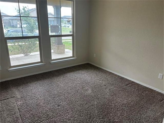 103 Beth Ann Loop, Taylor, TX 76574 - spare room with carpet flooring and baseboards