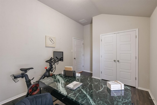 21510 Paine Ave, Lago Vista, TX 78645 - office area featuring vaulted ceiling and dark wood-style flooring