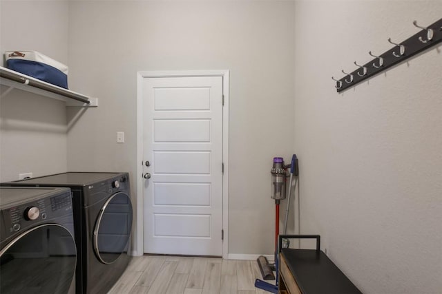 21510 Paine Ave, Lago Vista, TX 78645 - washroom with independent washer and dryer and light wood finished floors