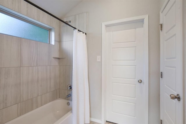 21510 Paine Ave, Lago Vista, TX 78645 - bathroom with shower / bath combo and vaulted ceiling