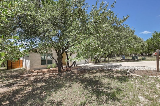 21510 Paine Ave, Lago Vista, TX 78645 - view of yard featuring a garage