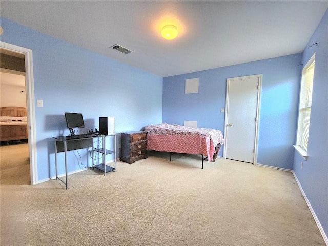 203 Pheasant Trl, Bastrop, TX 78602 - carpeted bedroom with baseboards and an office area