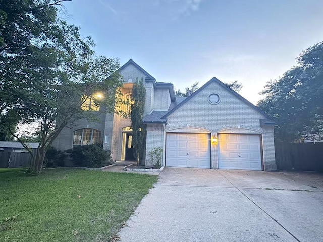 10204 Tenava Ct, Austin, TX 78726 - traditional-style house featuring concrete driveway, brick siding, and a garage