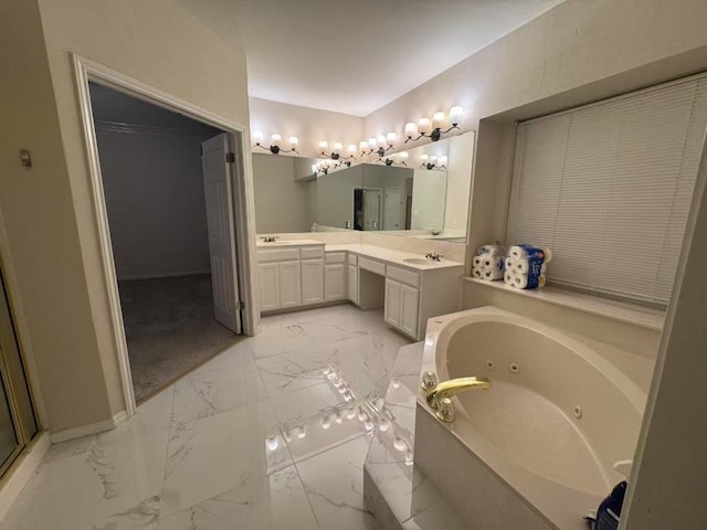 10204 Tenava Ct, Austin, TX 78726 - bathroom with marble look tile flooring, a whirlpool tub, and double vanity